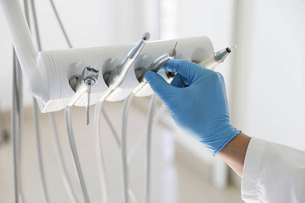 Professional Tooth Extraction technician working in Lexington, KY